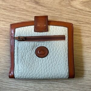 Vintage Dooney & Bourke Leather wallet. bifold snap closure. All weather leather